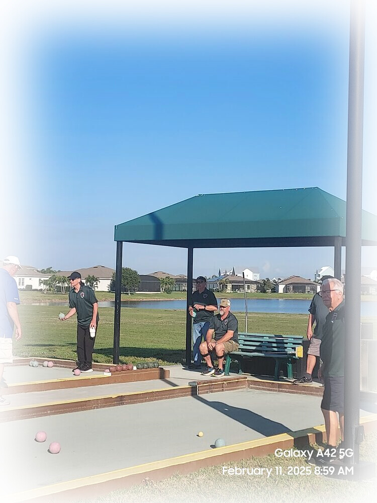 Bocce league players and spectators at the lakeside courts